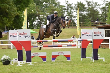 Ronnie Lee Jones takes the Connolly’s RED MILLS Senior Newcomers Second Round at Bicton Arena
